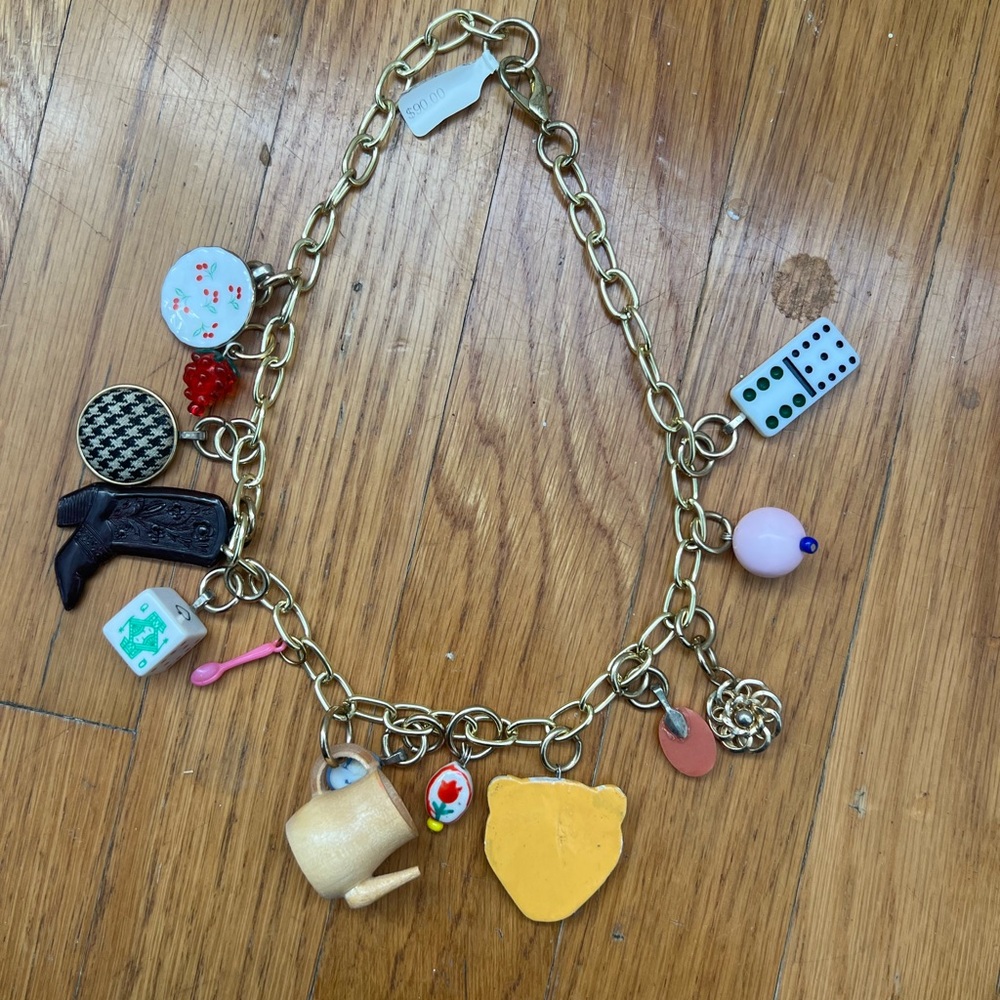 Gold and Red Necklace with Charming Accents